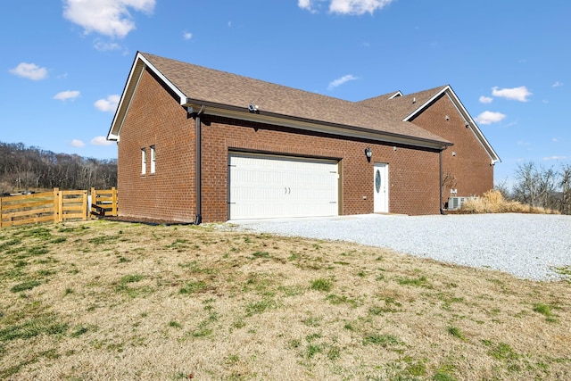 view of property exterior with a garage