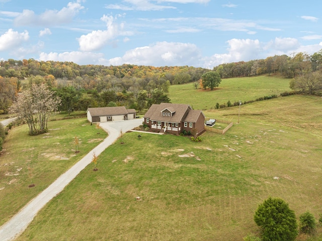 birds eye view of property featuring a rural view