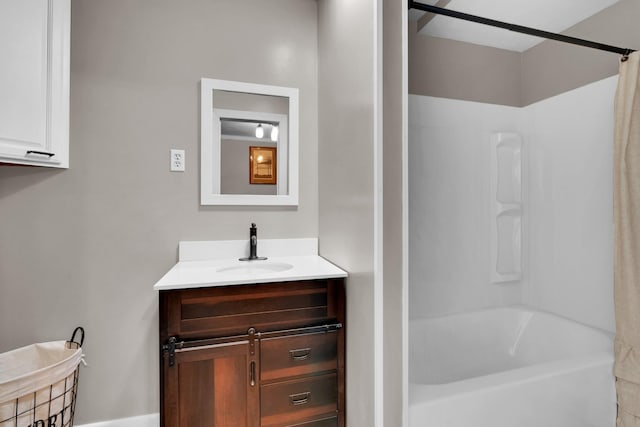 bathroom with shower / bath combination and vanity