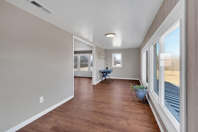 interior space with dark hardwood / wood-style floors