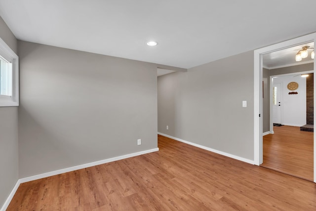 unfurnished room with light hardwood / wood-style floors