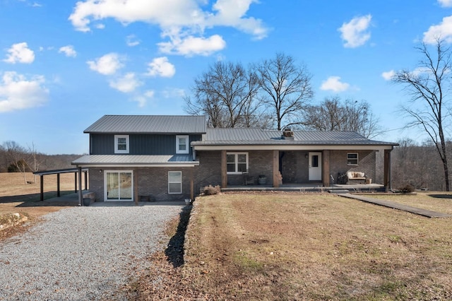 view of front of home with covered porch and a front yard