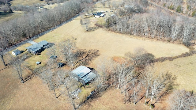 birds eye view of property featuring a rural view