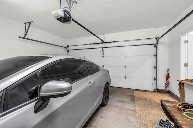 garage featuring a garage door opener