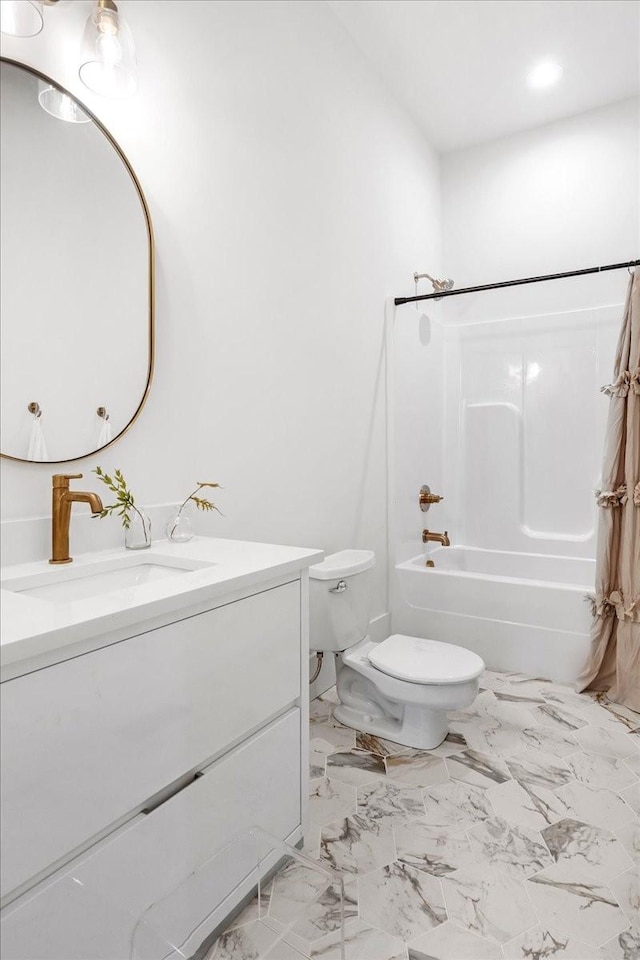 full bathroom featuring shower / tub combination, vanity, and toilet