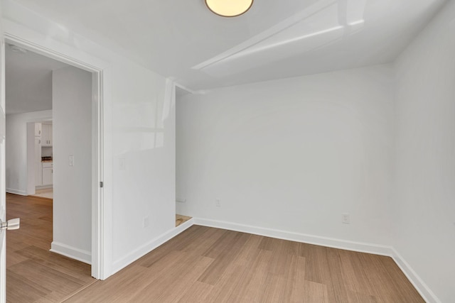 unfurnished room featuring wood-type flooring