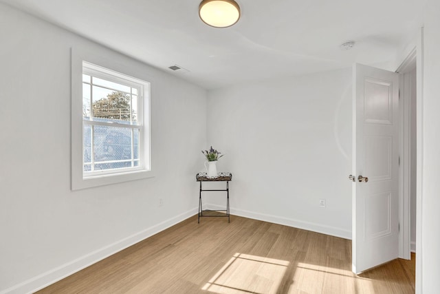 empty room featuring light hardwood / wood-style floors