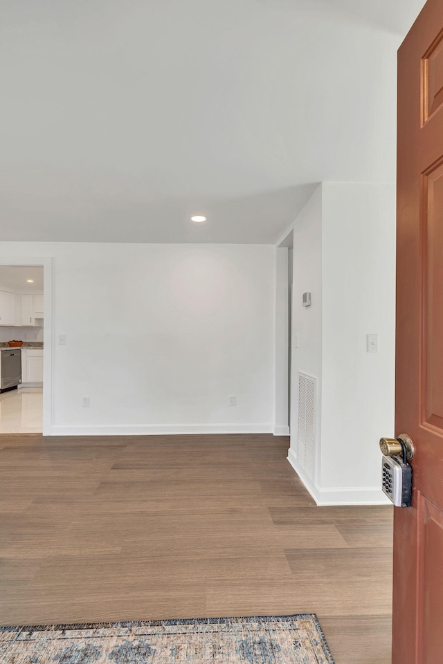 unfurnished room featuring light hardwood / wood-style flooring