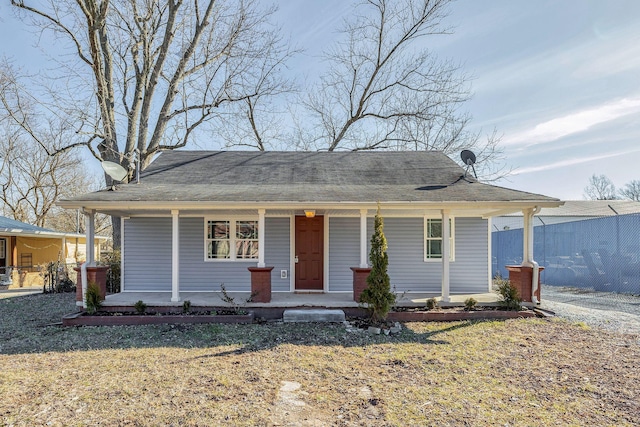 view of front of home featuring a front lawn and a porch