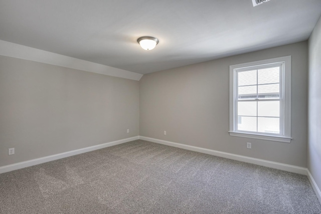 view of carpeted spare room