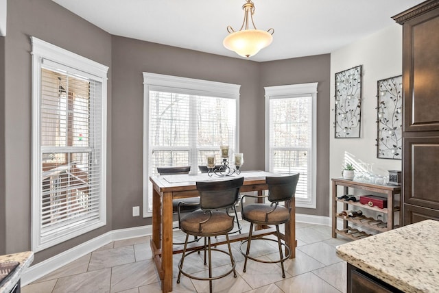 view of tiled dining area