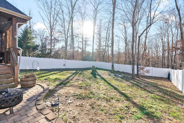 view of yard featuring a fire pit