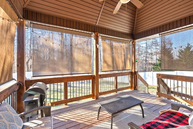 wooden deck with ceiling fan