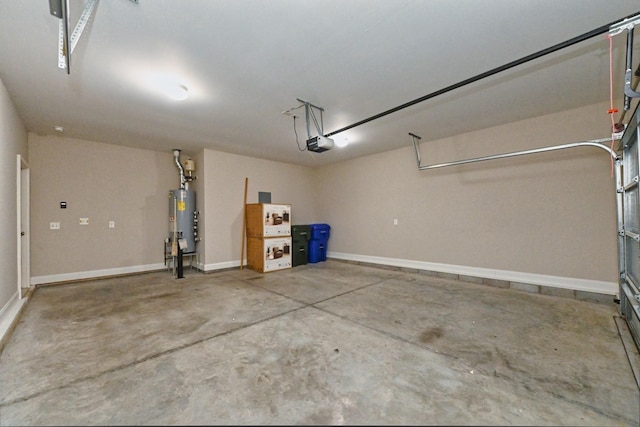 garage featuring a garage door opener and water heater