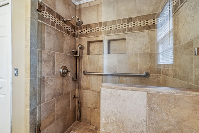 bathroom featuring a tile shower