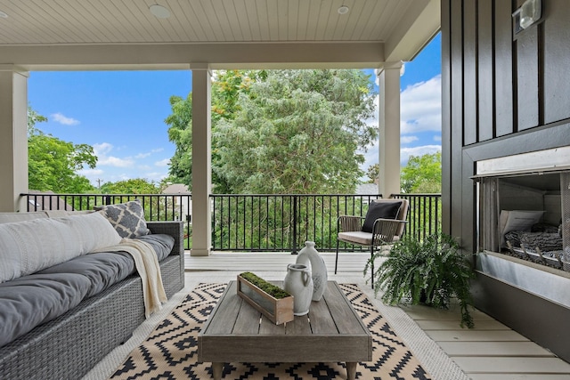 deck featuring outdoor lounge area