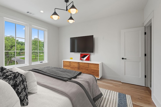 bedroom featuring light wood-type flooring