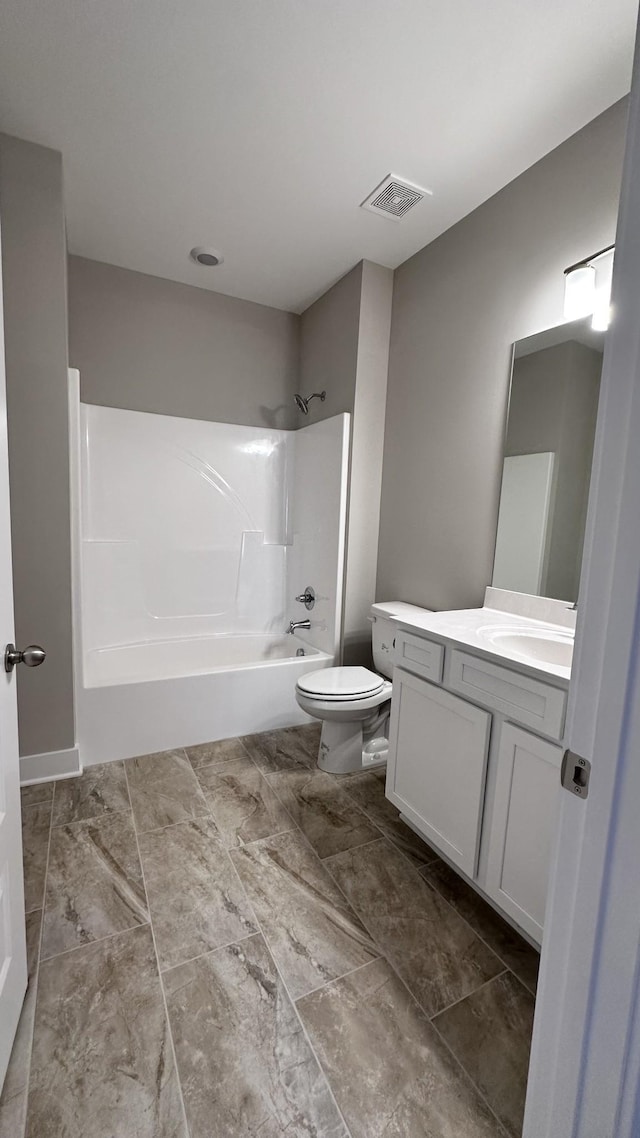 full bathroom featuring vanity,  shower combination, and toilet