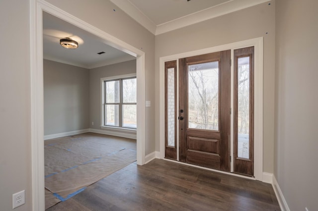 entrance foyer with dark hardwood / wood-style flooring and ornamental molding