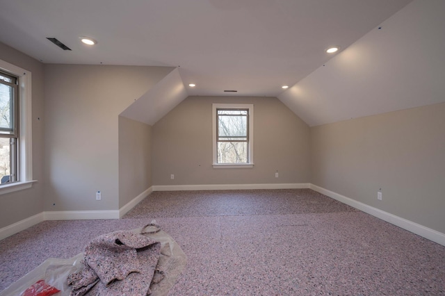 bonus room with lofted ceiling