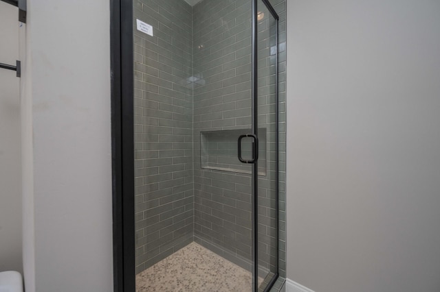 bathroom featuring walk in shower