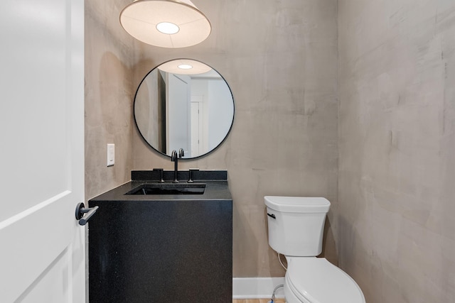 bathroom with toilet and sink