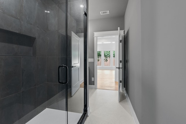 bathroom featuring walk in shower