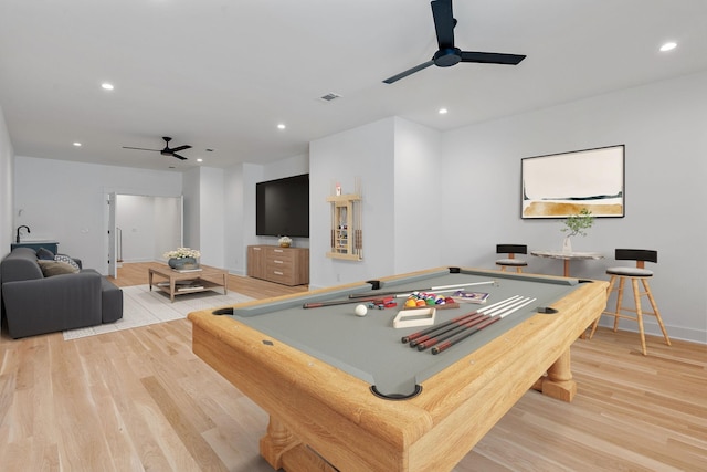 recreation room with hardwood / wood-style flooring, pool table, and ceiling fan