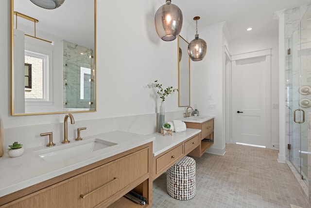 bathroom with vanity and an enclosed shower