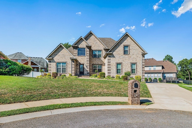 craftsman inspired home with a front yard