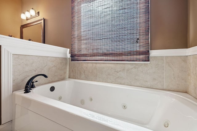 bathroom featuring a tub to relax in