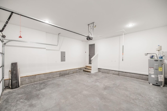 garage featuring a garage door opener, electric panel, and water heater