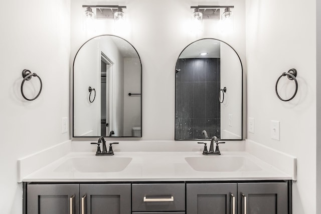 bathroom featuring vanity and toilet