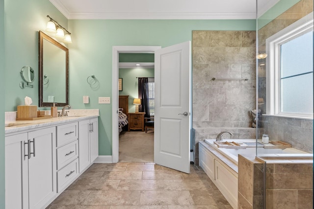 bathroom featuring ornamental molding, a relaxing tiled tub, and vanity