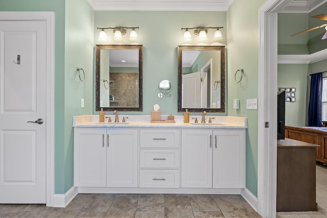 bathroom with vanity, ceiling fan, crown molding, and walk in shower