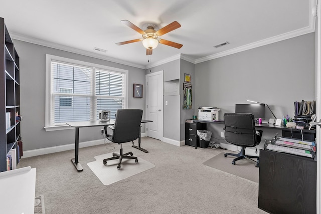 home office with crown molding, light colored carpet, and ceiling fan