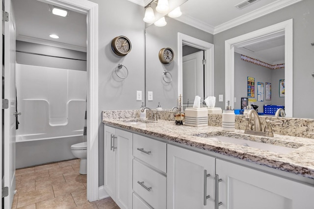 full bathroom with tile patterned flooring, vanity, toilet, crown molding, and washtub / shower combination