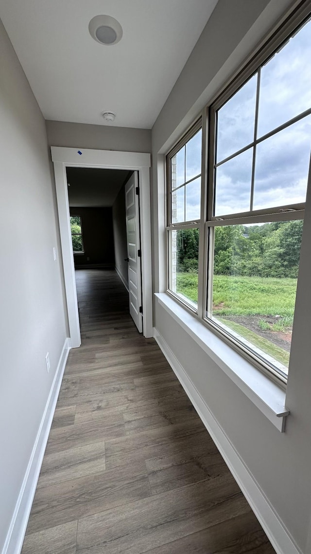 hallway with light wood-type flooring