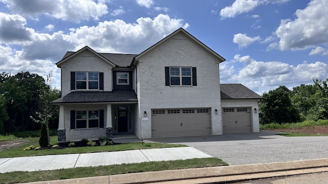 view of front of property with a garage