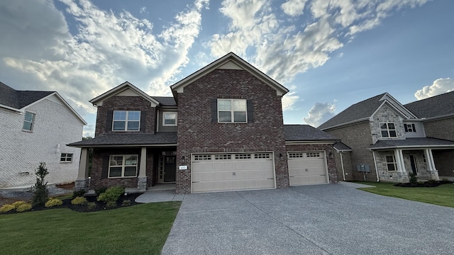 843 Stovers Gln, Murfreesboro, TN 37128 - view of front facade featuring brick siding, driveway, and a front yard
