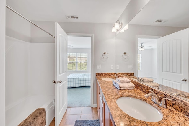 bathroom featuring vanity and tile patterned flooring