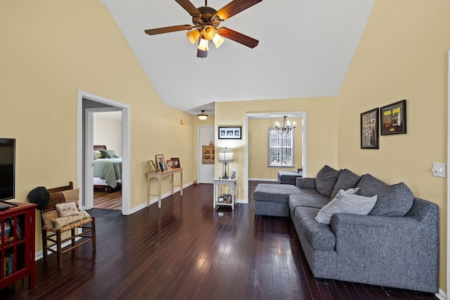 living room with hardwood / wood-style flooring, high vaulted ceiling, and ceiling fan with notable chandelier