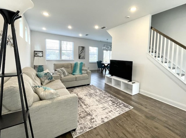 living room with dark wood-type flooring