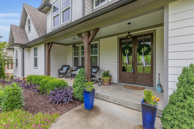 517 Kestrel Ln, Chattanooga, TN 37419 - doorway to property featuring french doors, covered porch, and a shingled roof