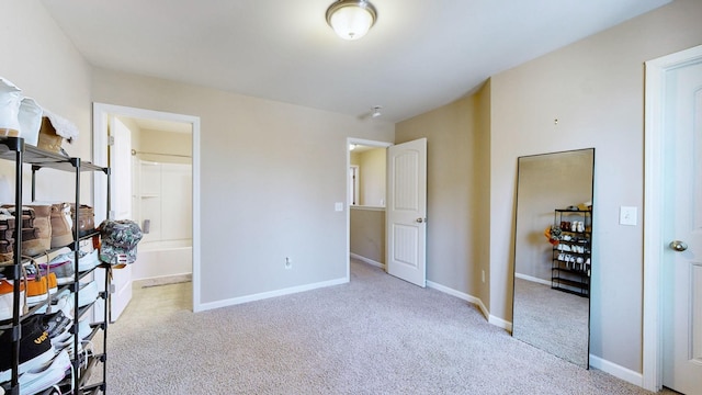 bedroom featuring light colored carpet