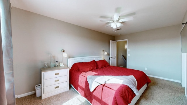 bedroom featuring light carpet and ceiling fan