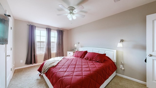 bedroom featuring ceiling fan and carpet floors