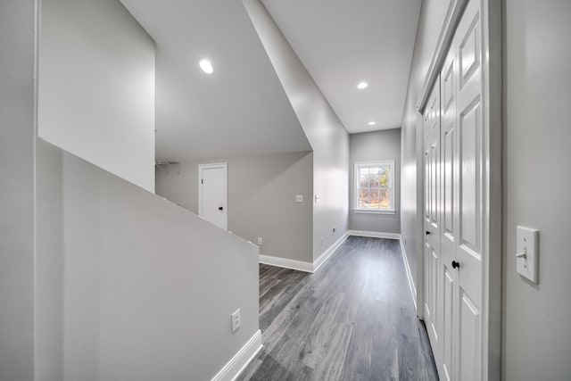 hallway with dark wood-type flooring