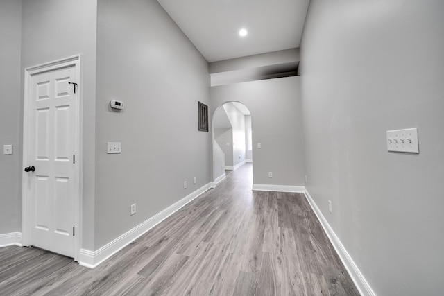 corridor featuring light hardwood / wood-style floors