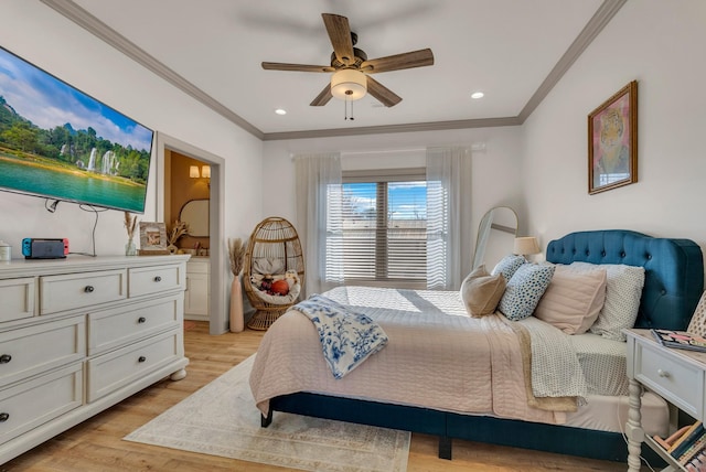 bedroom featuring crown molding, ceiling fan, connected bathroom, and light hardwood / wood-style flooring